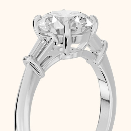 Abby Baguette Three-Stone Round Diamond Engagement Ring in Silver - slant-view.webp