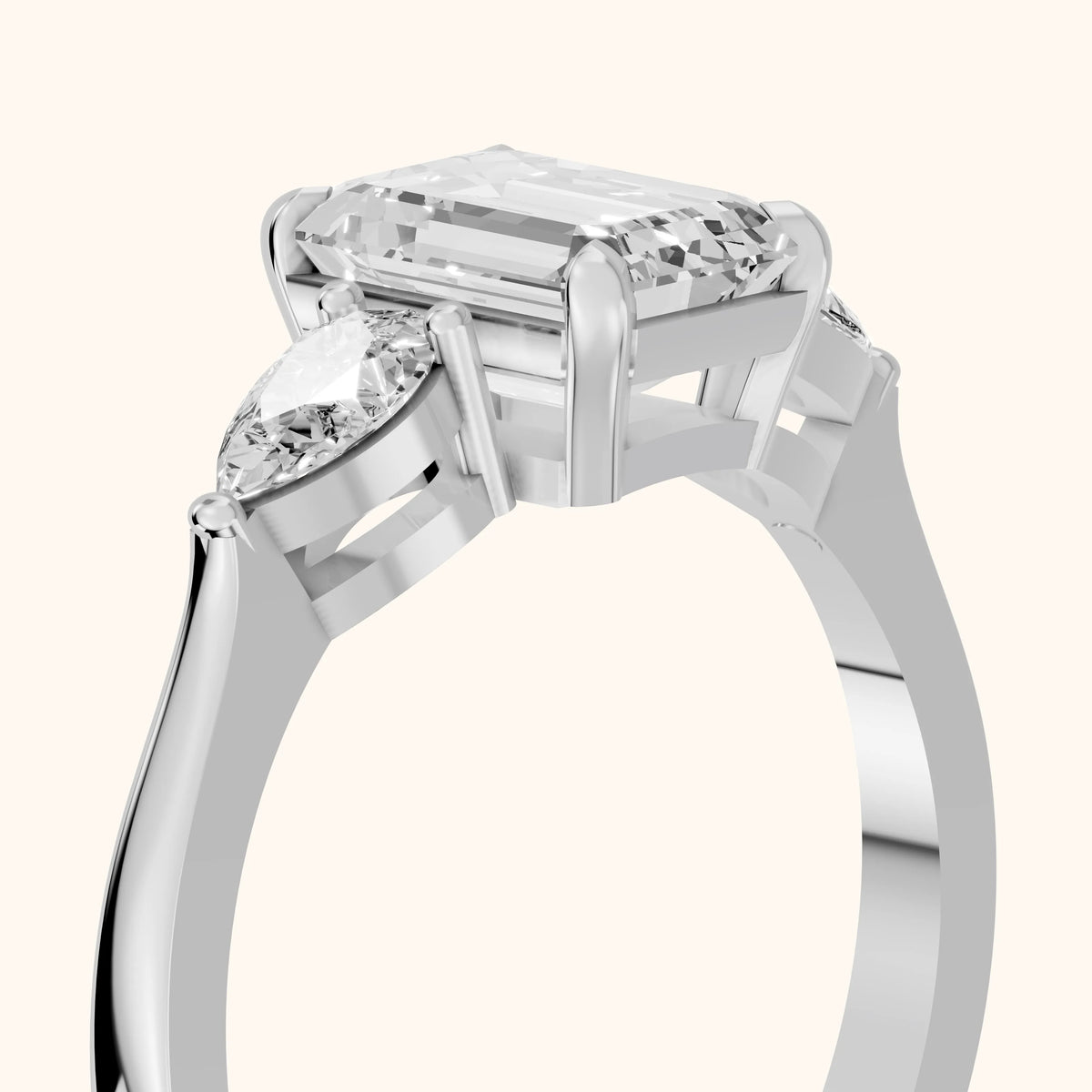Grace Three Stone Emerald Diamond Engagement Ring in Platinum - slant-view.webp