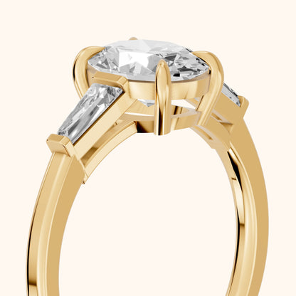 Winnie Three-Stone Oval Diamond Engagement Ring in Yellow Gold - slant-view.webp