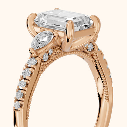 Weston Pear-Side Three-Stone Emerald Diamond Engagement Ring in Rose Gold - slant-view.webp