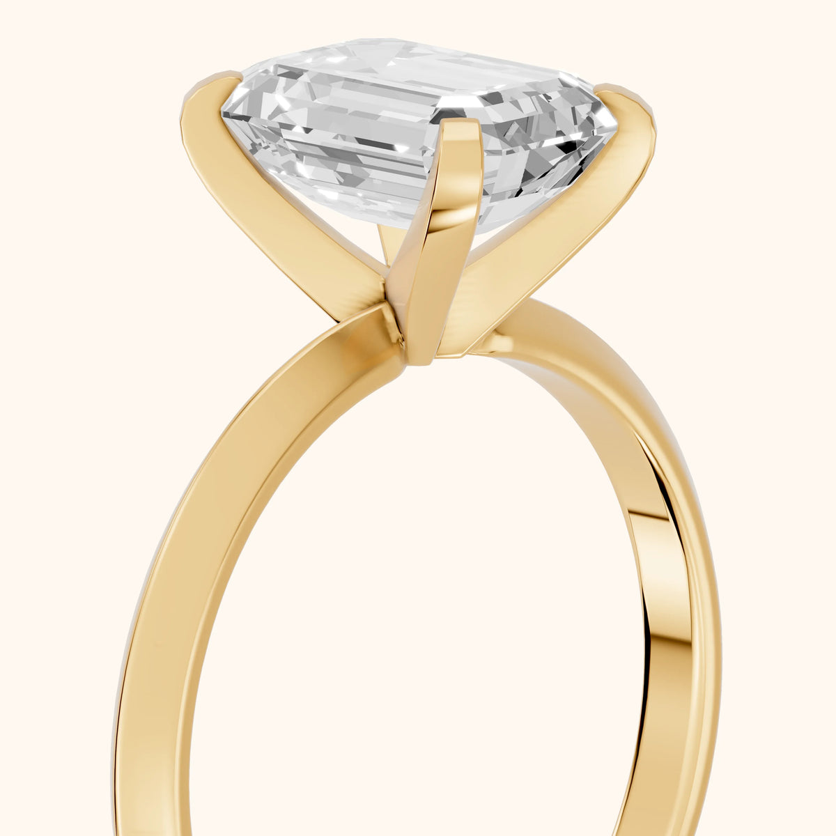 Verity Solitaire Knife Edge Emerald Diamond Engagement Ring in Yellow Gold - slant-view.webp