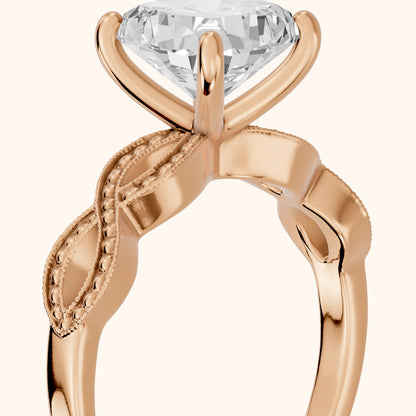 Jeanie Twist Solitaire Cushion Diamond Engagement Ring in Rose Gold - slant-view.webp
