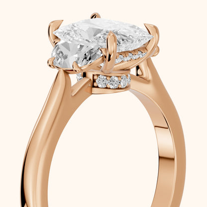 Romy Three-Stone Radiant Diamond Engagement Ring in Rose Gold - slant-view.webp