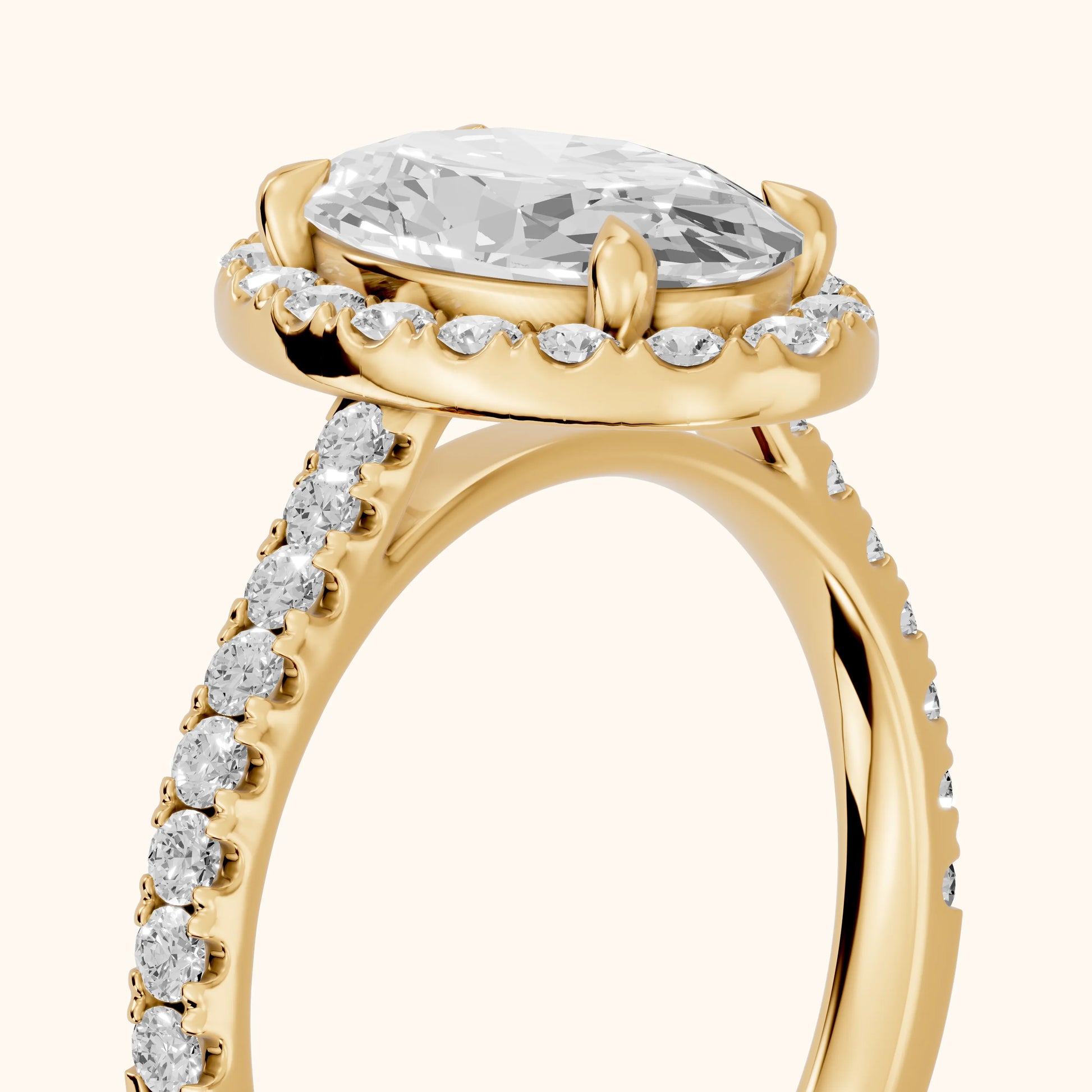 Amara Halo Claw Prong Oval Diamond Ring in Yellow Gold - slant-view.webp
