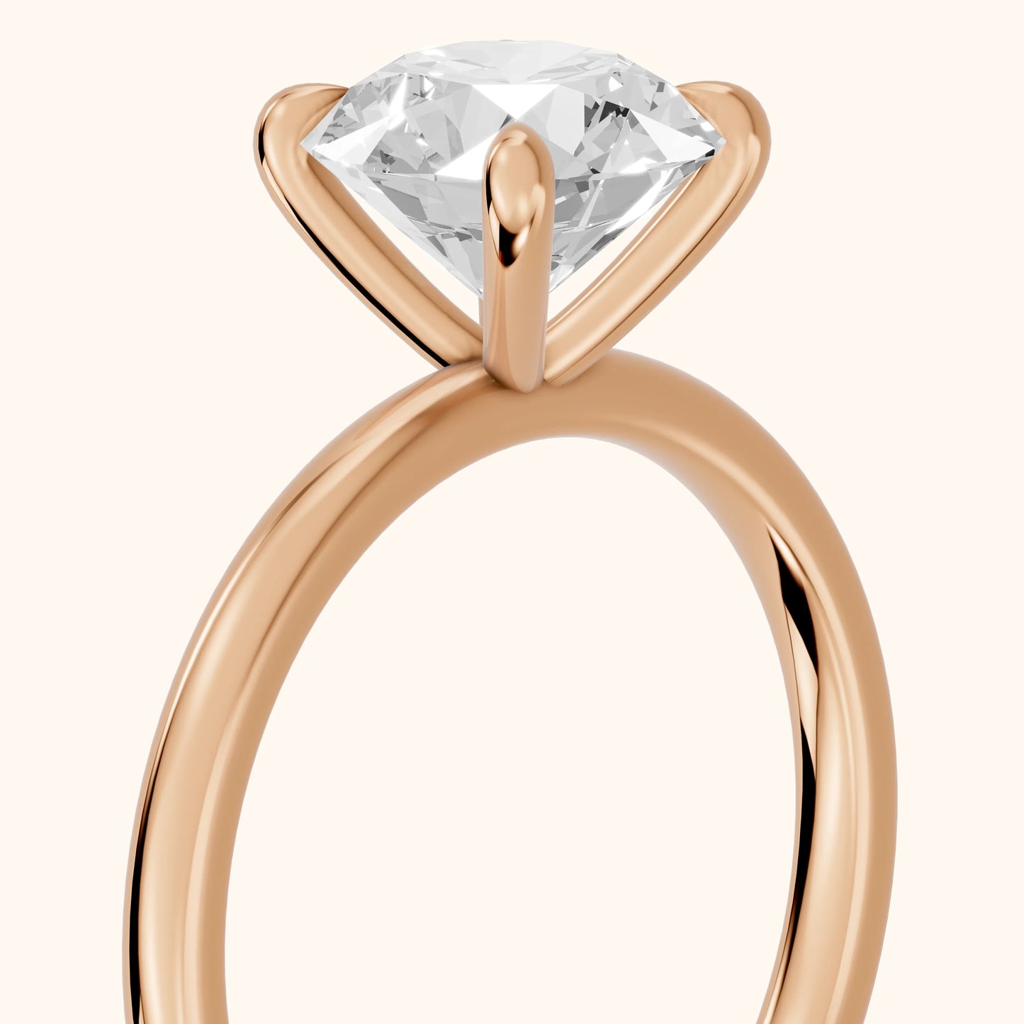 Nella Petite Solitaire Round Diamond Engagement Ring in Rose Gold - slant-view.webp