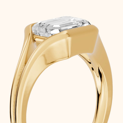 Windsor Half Bezel Solitaire Emerald Diamond Engagement Ring in Yellow Gold - slant-view.webp