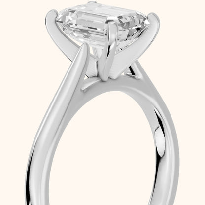 Enid Solitaire Cathedral Emerald Diamond Engagement Ring in Platinum - slant-view.webp