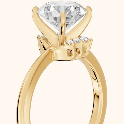 Peony East-West Hidden Halo Round Diamond Engagement Ring in Yellow Gold - slant-view.webp