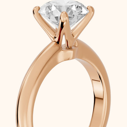 Clementine Solitaire Round Diamond Engagement Ring in Rose Gold - slant-view.webp