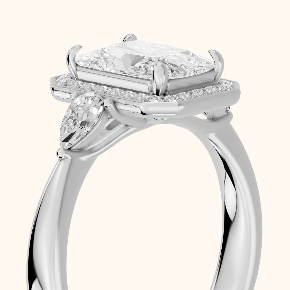 Eliza Halo Sidestone Radiant Diamond Engagement Ring in Platinum - slant-view.webp