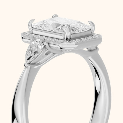 Eliza Halo Sidestone Radiant Diamond Engagement Ring in Platinum - slant-view.webp