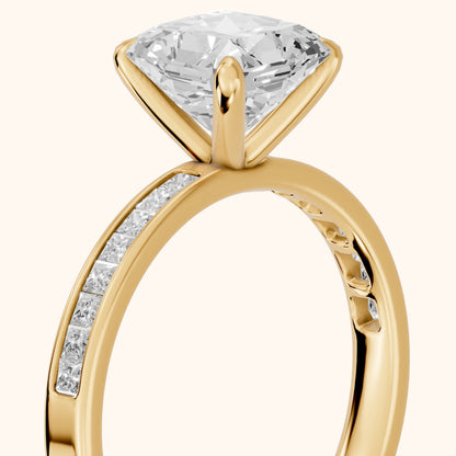 Maren Sidestone Channel Set Radiant Diamond Engagement Ring in Yellow Gold - slant-view.webp