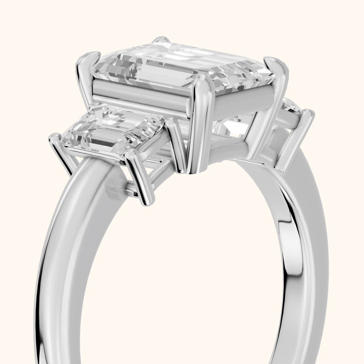 Zoe Three-Stone Emerald Diamond Ring in White Gold - slant-view.webp