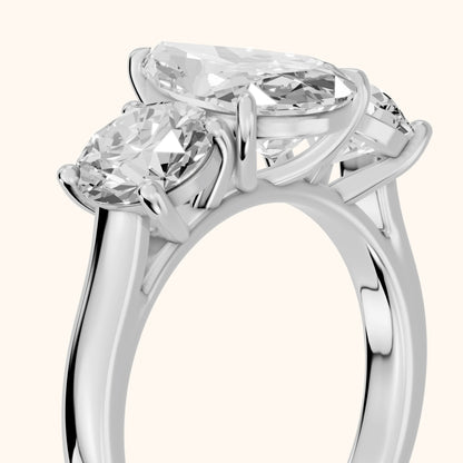Esme Three-Stone Tapered Pear Diamond Ring in Platinum - slant-view.webp