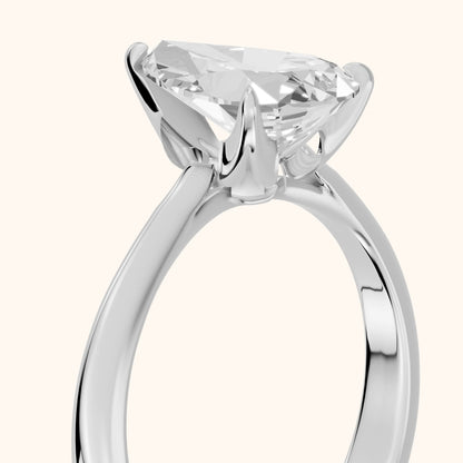Evie Solitaire Six-Prong Pear Diamond Engagement Ring in White Gold - slant-view.webp