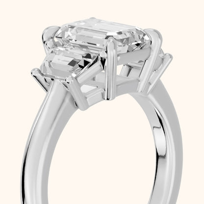 Filippa Trapezoid Three-Stone Emerald Diamond Engagement Ring in Platinum - slant-view.webp