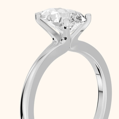 Matilda Cathedral Solitaire Pear Diamond Engagement Ring in Platinum - slant-view.webp