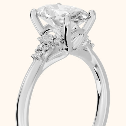 Vail Starburst Cluster Oval Diamond Engagement Ring in Platinum - slant-view.webp