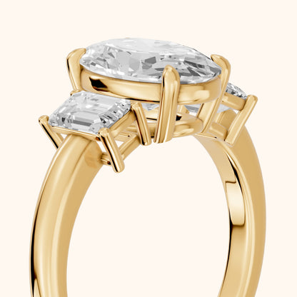 Zoe Three-Stone Oval Diamond Ring in Yellow Gold - slant-view.webp