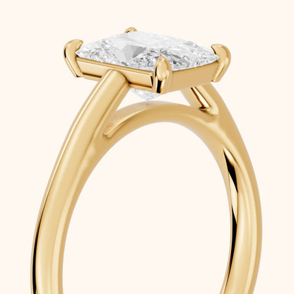 Sadie Cathedral Solitaire Radiant Diamond Engagement Ring in Yellow Gold - slant-view.webp