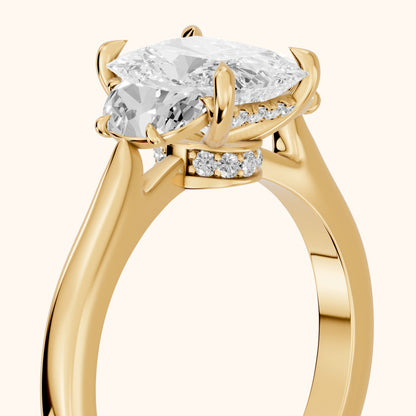 Romy Three-Stone Radiant Diamond Engagement Ring in Yellow Gold - slant-view.webp