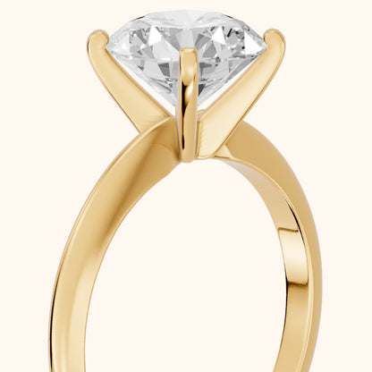 Giulia Solitaire Round Diamond Engagement Ring in Yellow Gold - slant-view.webp
