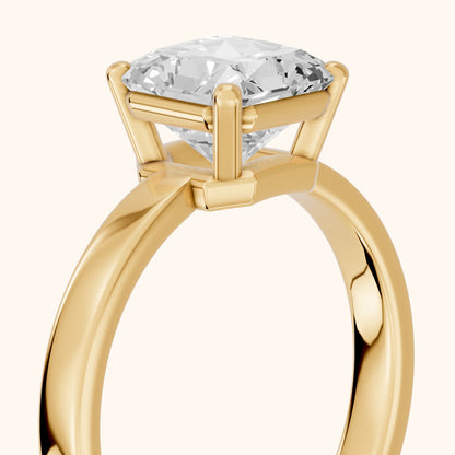 Delia Solitaire Radiant Diamond Engagement Ring in Yellow Gold - slant-view.webp