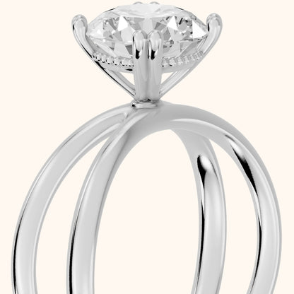 Yvonne Crossover Solitaire Round Diamond Engagement Ring in Platinum - slant-view.webp