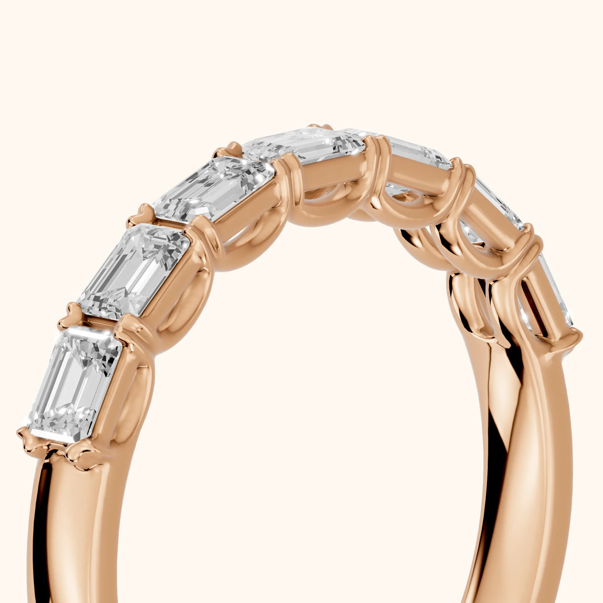 Margot Shared Prong Emerald Diamond Half Eternity Band in Rose Gold - slant-view