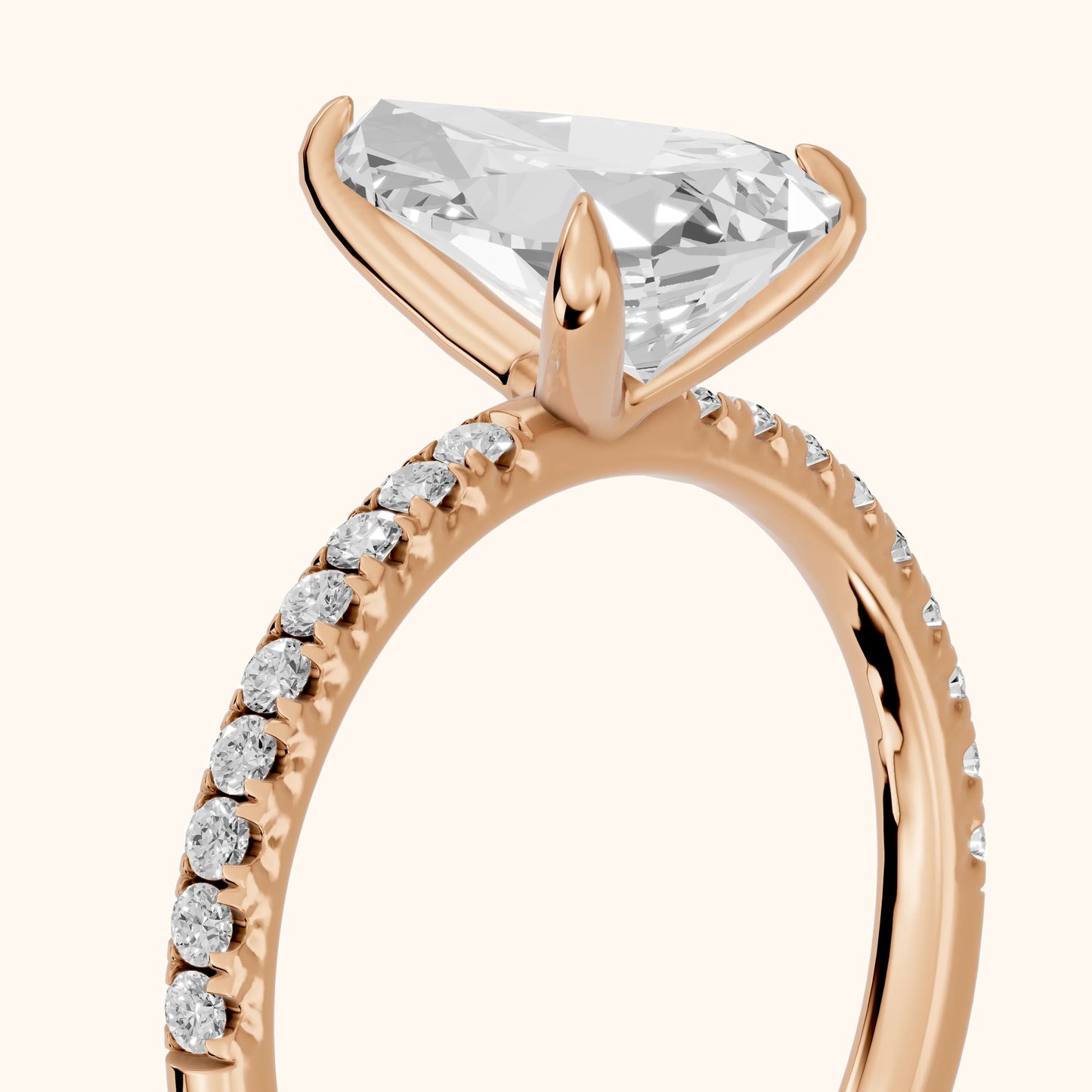 Ione Solitaire Pavé Pear Diamond Engagement Ring in Rose Gold - slant-view.webp