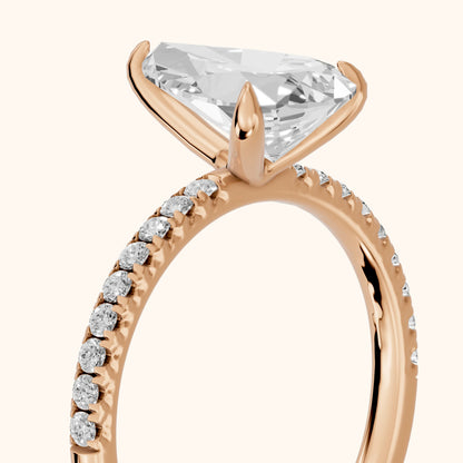 Ione Solitaire Pavé Pear Diamond Engagement Ring in Rose Gold - slant-view.webp