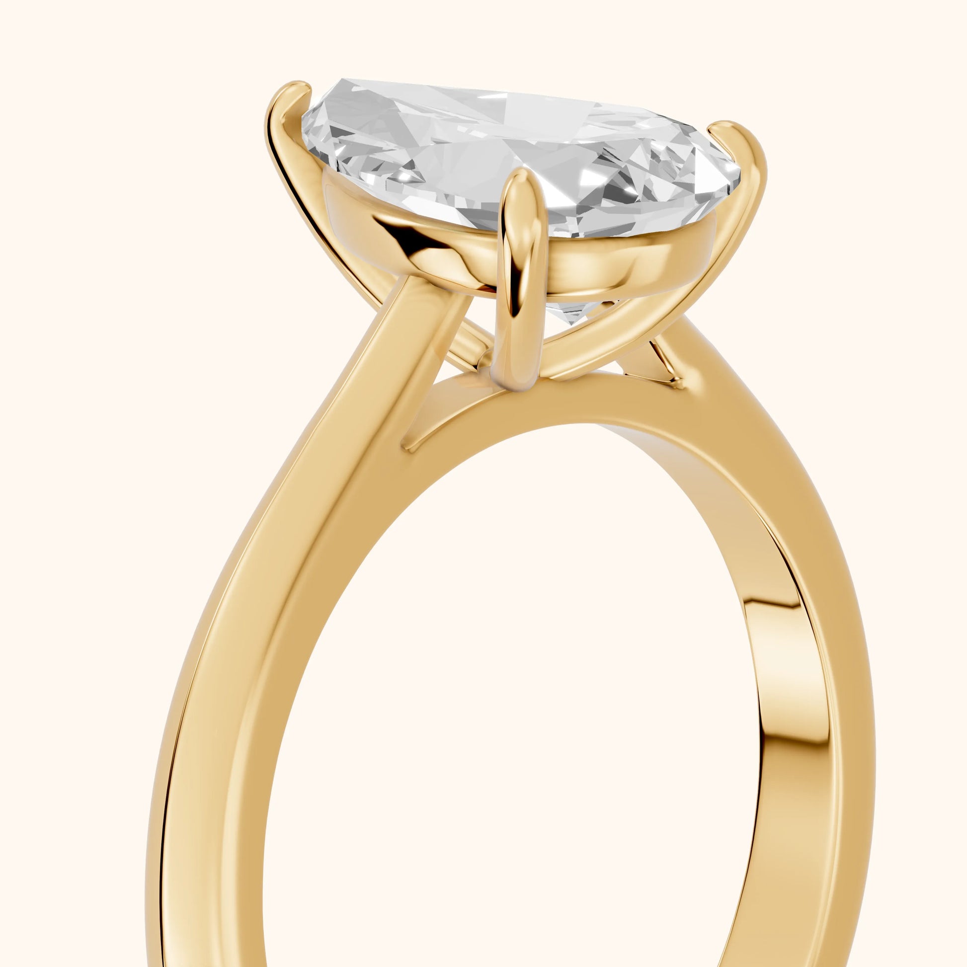 Kalia Knife Edge Solitaire Pear Diamond Engagement Ring in Yellow Gold - slant-view.webp