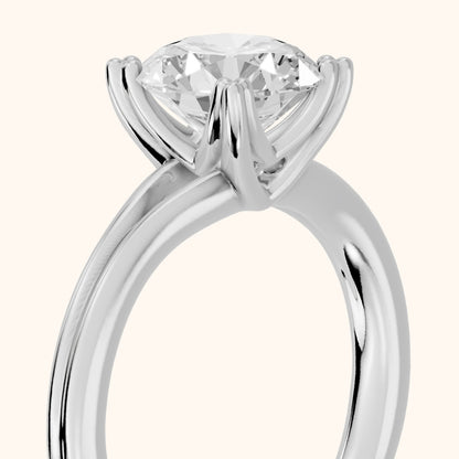Neve Solitaire Split Shank Round Diamond Engagement Ring in Silver - slant-view.webp
