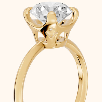 Adele Crown Solitaire Round Diamond Engagement Ring in Yellow Gold - slant-view.webp