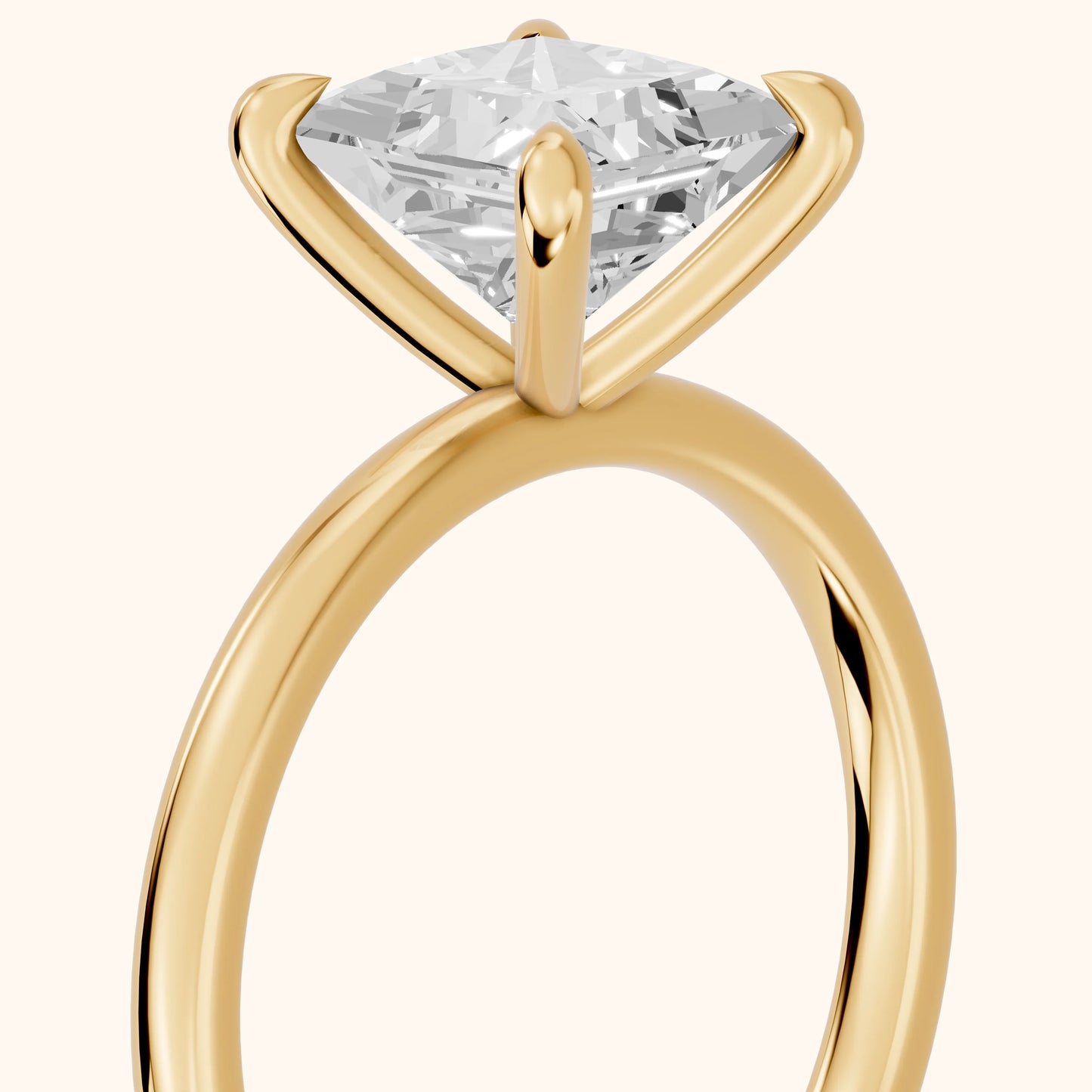 Nella Petite Solitaire Princess Diamond Engagement Ring in Yellow Gold - slant-view.webp
