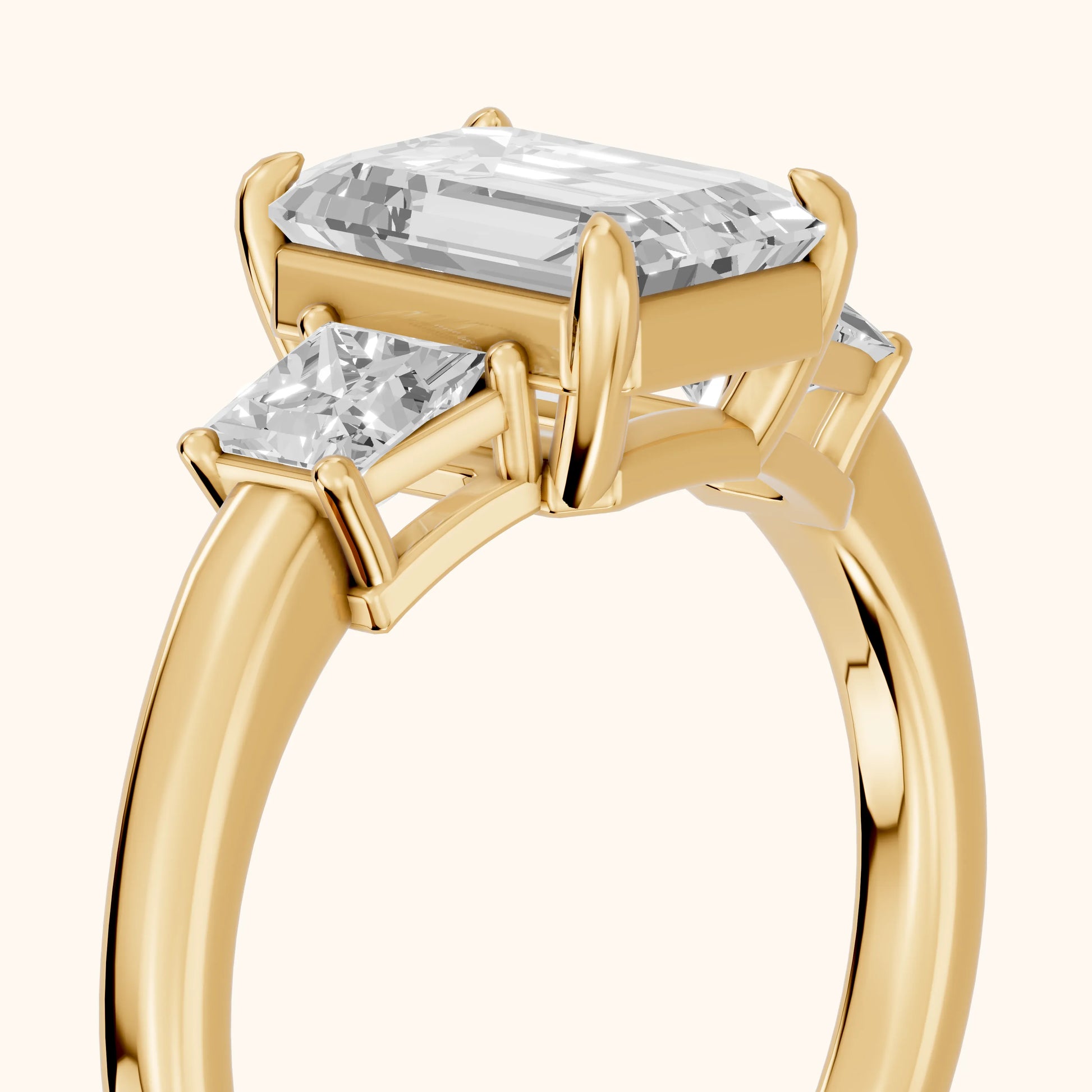 Selena Three-Stone Basket Emerald Diamond Ring in Yellow Gold - slant-view.webp