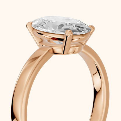 Delia Solitaire Oval Diamond Engagement Ring in Rose Gold - slant-view.webp