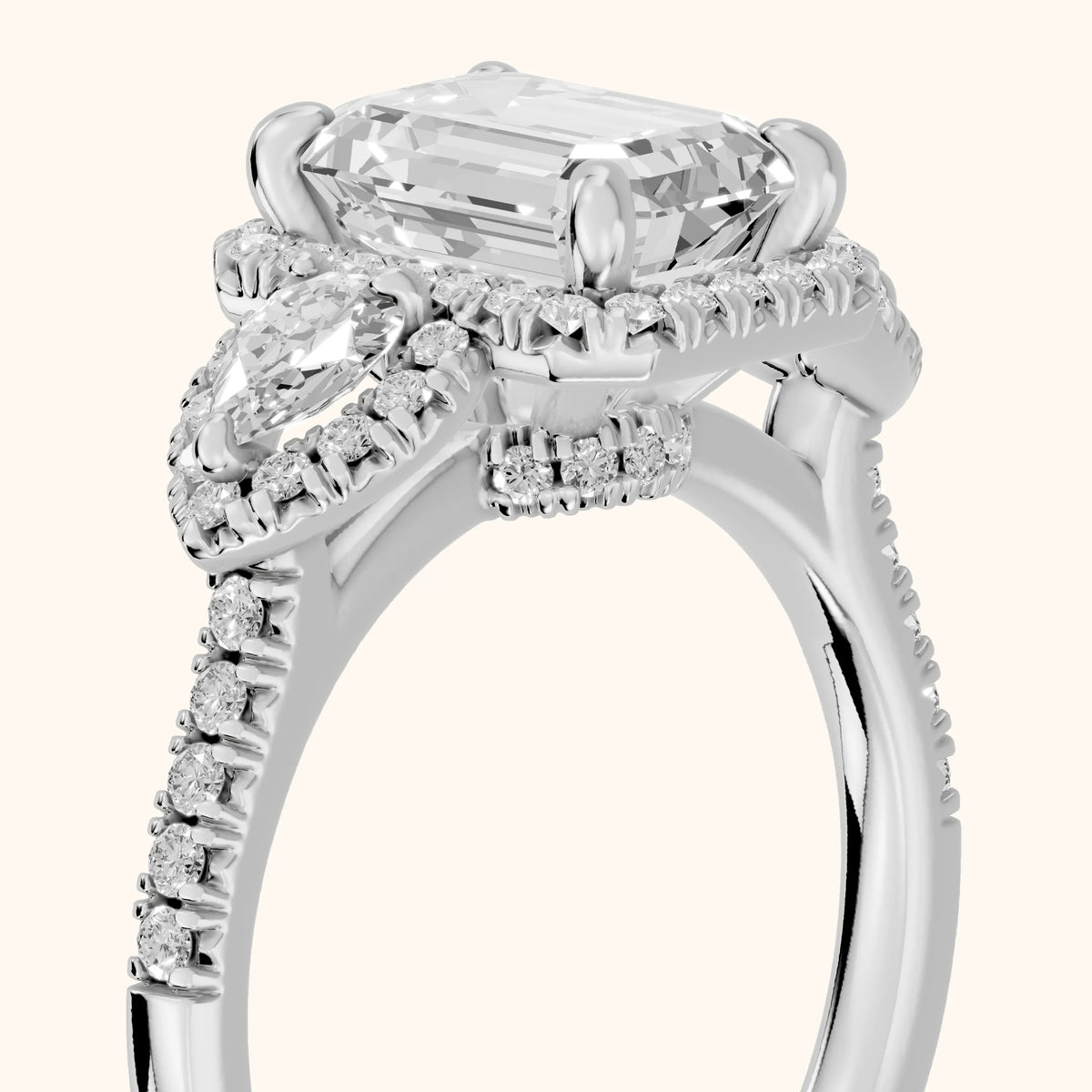 Camden Three-Stone Halo Emerald Diamond Engagement Ring in White Gold - slant-view.webp
