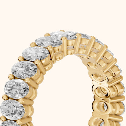 Renata Shared Prong Oval Diamond Eternity Band in Yellow Gold - slant-view
