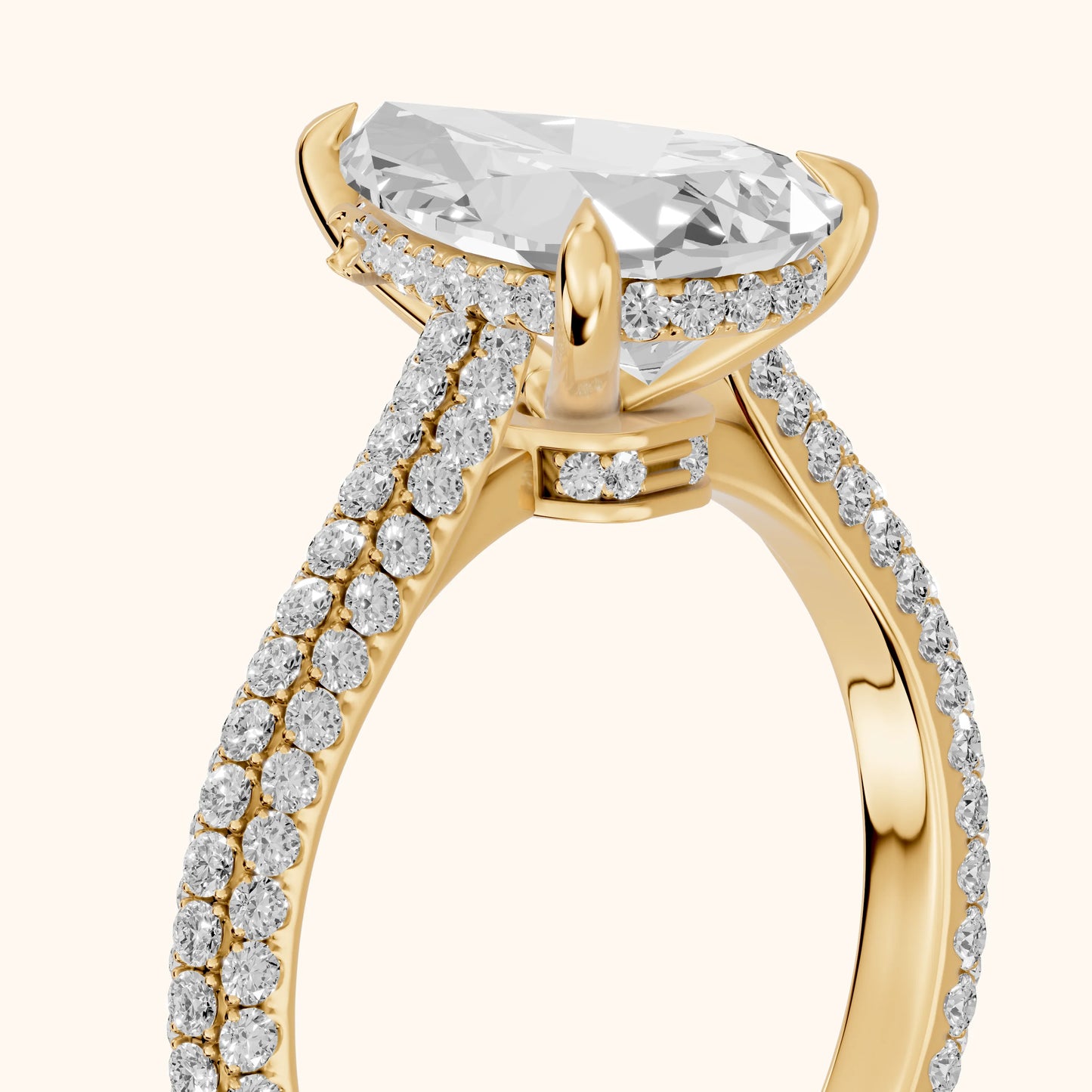 Della Hidden Halo Pavé Pear Diamond Engagement Ring in Yellow Gold - slant-view.webp
