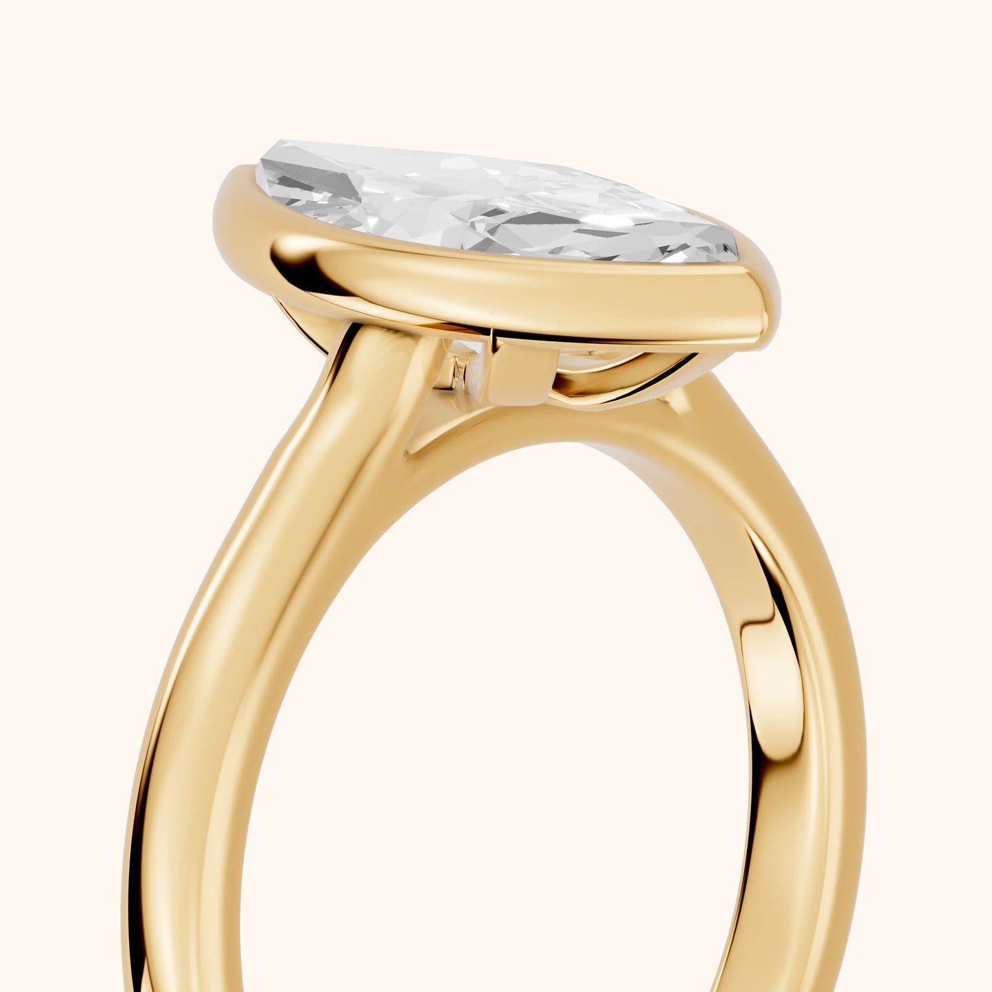 Jolie Bezel Solitaire Marquise Diamond Engagement Ring in Yellow Gold - slant-view.webp