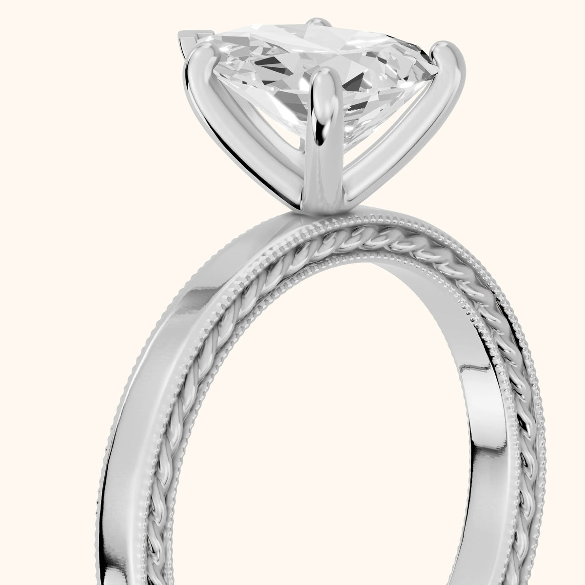 Kerry Engraved Solitaire Pear Diamond Engagement Ring in Silver - slant-view.webp
