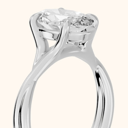 Rosa Twist Solitaire Oval Diamond Engagement Ring in Platinum - slant-view.webp