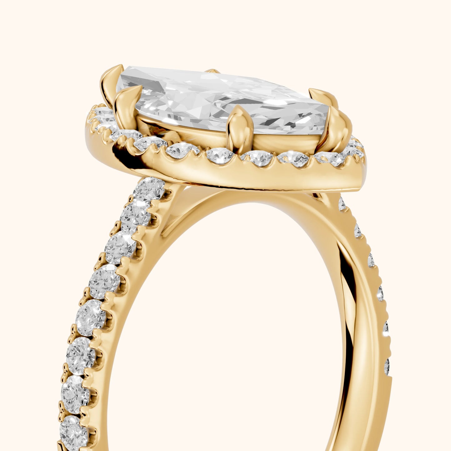 Amara Halo Claw Prong Marquise Diamond Ring in Yellow Gold - slant-view.webp