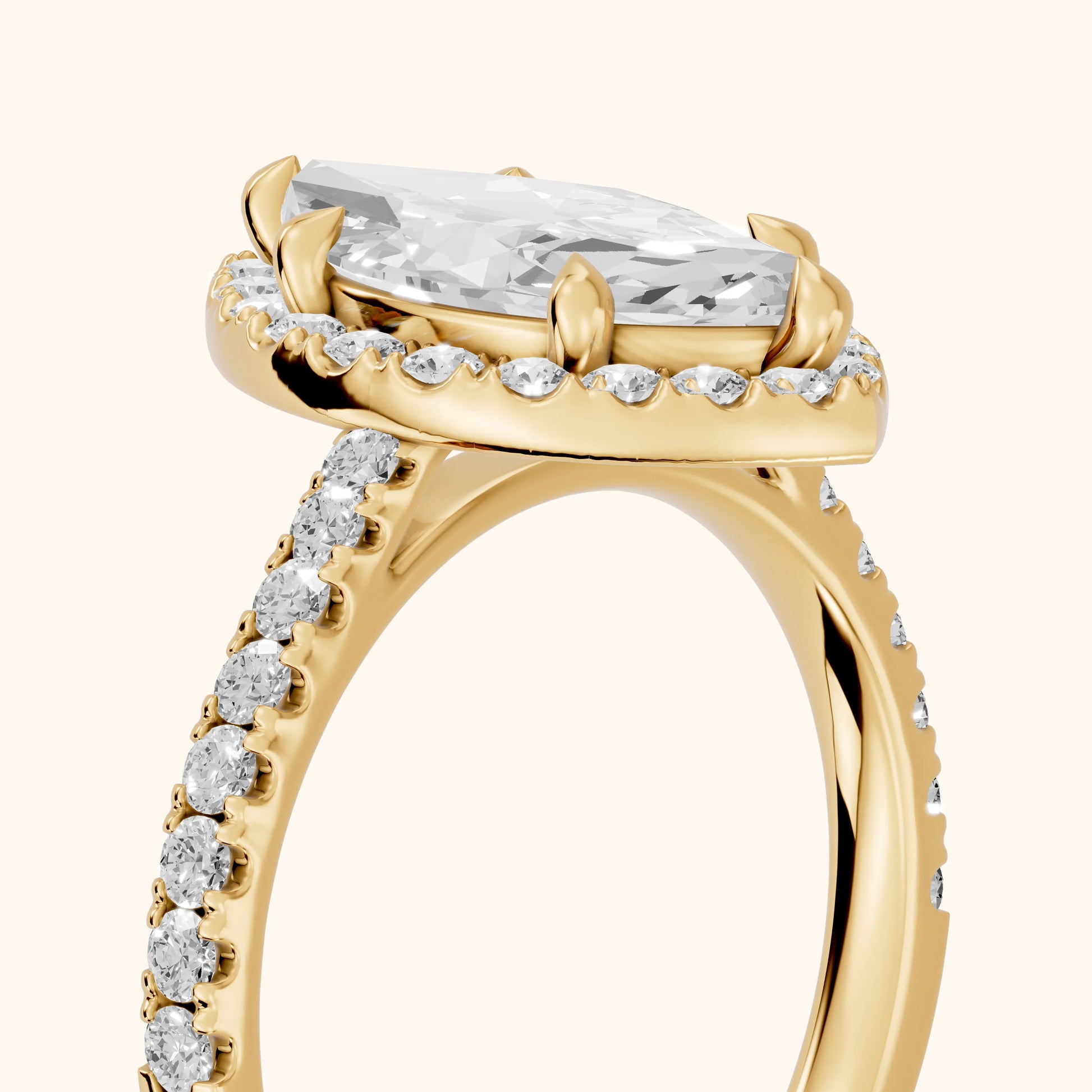 Amara Halo Claw Prong Marquise Diamond Ring in Yellow Gold - slant-view.webp