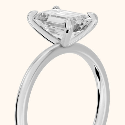 Nella Petite Solitaire Emerald Diamond Engagement Ring in Silver - slant-view.webp