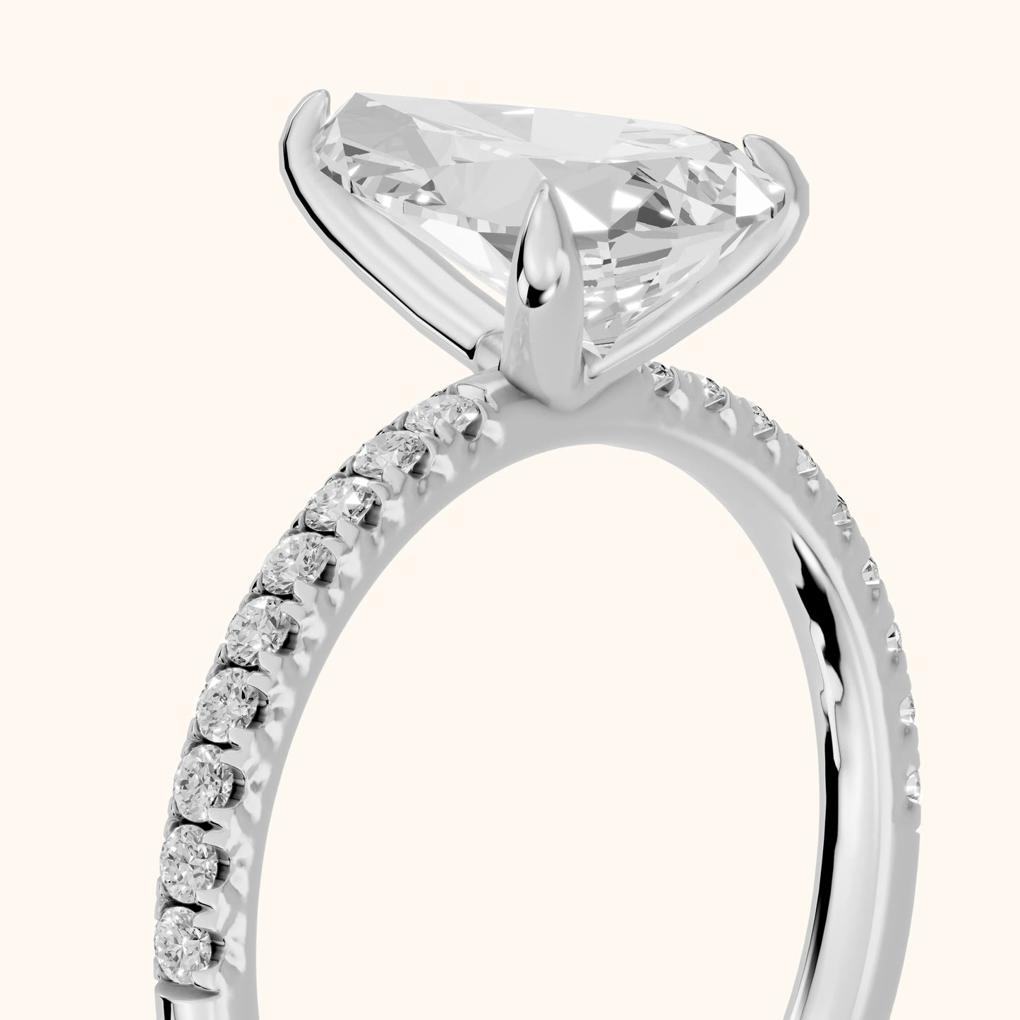 Ione Solitaire Pavé Pear Diamond Engagement Ring in Silver - slant-view.webp