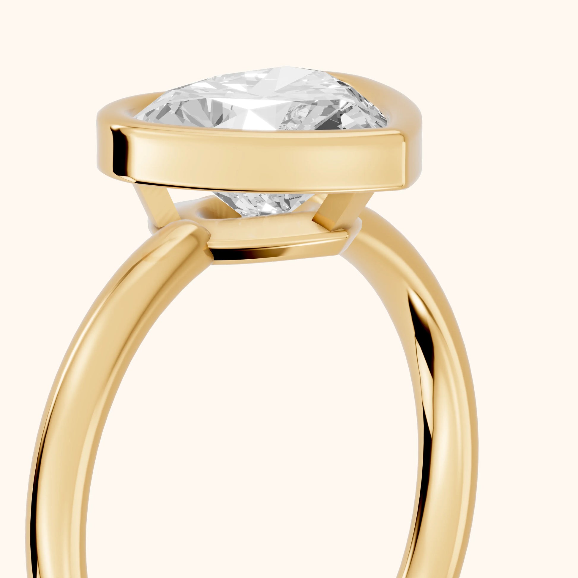 Maeve Bezel Solitaire Heart Diamond Ring in Yellow Gold - slant-view.webp
