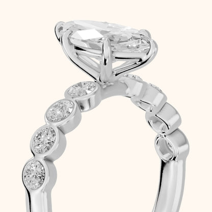 Edie Beaded Bezel Marquise Diamond Engagement Ring in Platinum - slant-view.webp