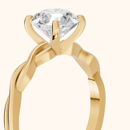Iris Twist Round Diamond Engagement Ring in Yellow Gold - slant-view.webp